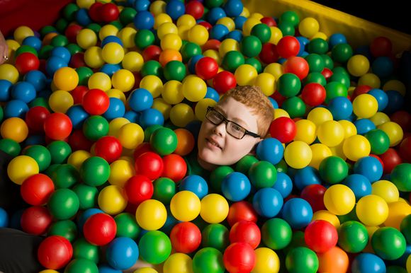 Student in ball pit