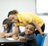 Female teacher with male student